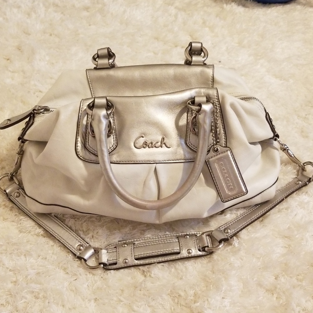 White and silver leather Coach purse
